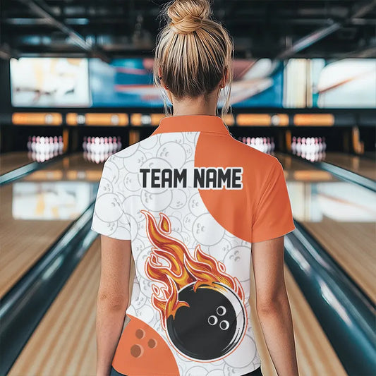 Person wearing a bowling shirt with 'TEAM NAME' on the back in a bowling alley.